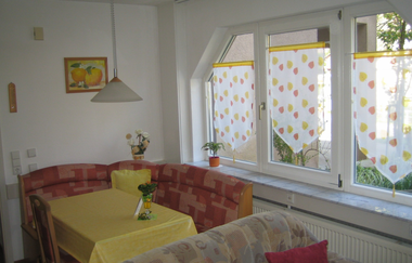 Essecke und Wohnbereich | © Touristikgemeinschaft Hohenlohe e. V. | Ferienwohnung Gerigk