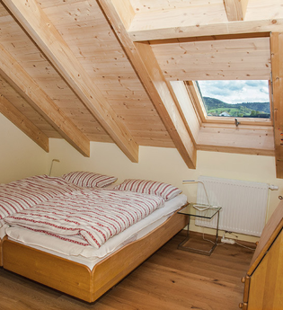 Ferienwohnung Im Dorf in Michelbach: Schlafzimmer 1 | © Hohenlohe Schwäbisch Hall