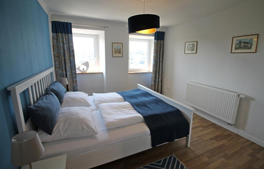 Ferienwohnung im Hofratshaus: Schlafzimmer | © Hohenlohe Schwäbisch Hall