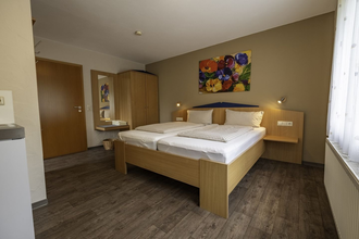 Holzbett für zwei | © Touristikgemeinschaft Hohenlohe e. V. | Dominik Rau