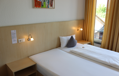 Doppelbett | © Gästehaus zum Wolffenturm