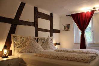 Schlafzimmer | Hotel Herberge zur Traube | Bad Wimpfen | HeilbronnerLand | © Hotel Herberge zur Traube
