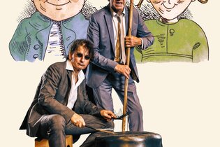 Das Musikerduo Huub Dutch sitzen vor dem Bild von Max und Moritz