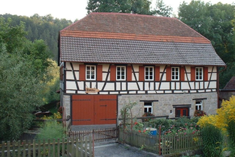Das historische Fachwerkgebäude der Ölmühle Dörzbach | © Touristikgemeinschaft Hohenlohe e. V.  | Marion Schlund