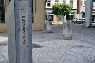 Kostenloses Trinkwasser am Brunnen | © Touristikgemeinschaft Hohenlohe e. V. | Stadt Öhringen