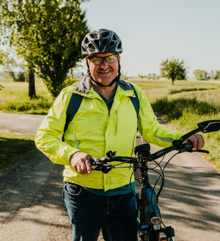 Radfahrer lächelt in die Kamera | © Stadtverwaltung Crailsheim