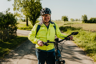 Radfahrer lächelt in die Kamera | © Stadtverwaltung Crailsheim