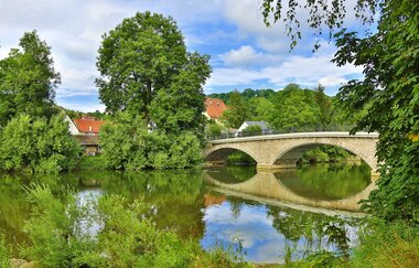 Die Weinbaugemeinde Dörzbach liegt idyllisch im Jagsttal auf der Etappe des Württemberger Weinradwegs. | © Touristikgemeinschaft Hohenlohe, Künzelsau / Andi Schmid