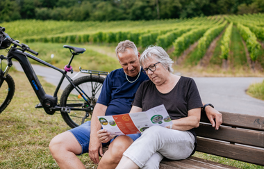 Radfahrer machen eine Pause. | © Hohenloher Perlen